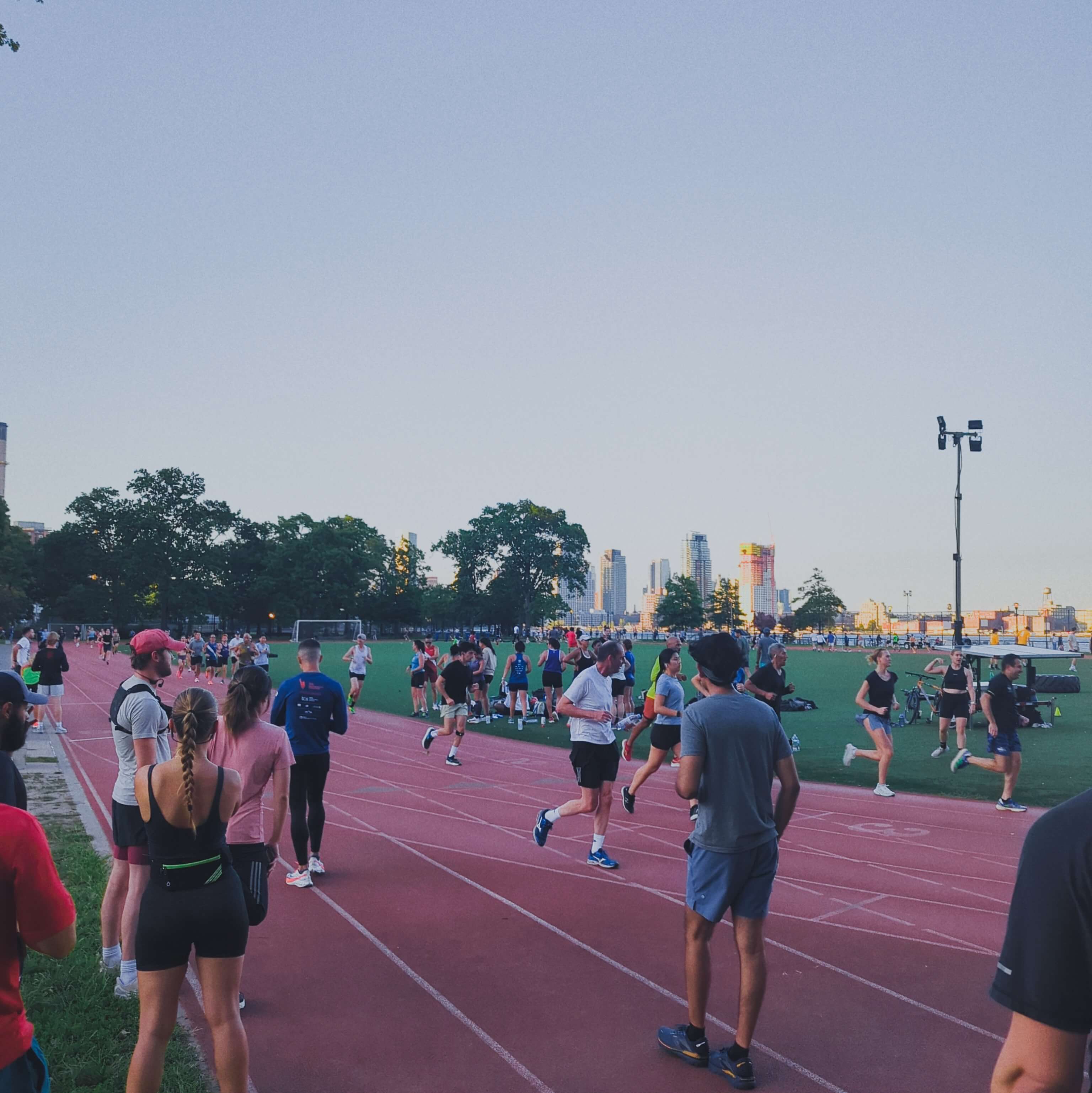 Group of runners near a park track in new york city